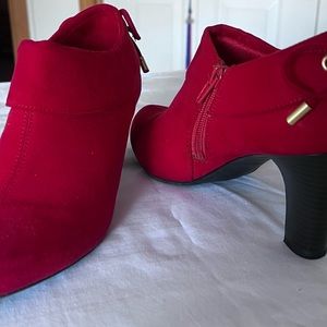 Coach and four red ankle boots size 7.5. Great condition.
